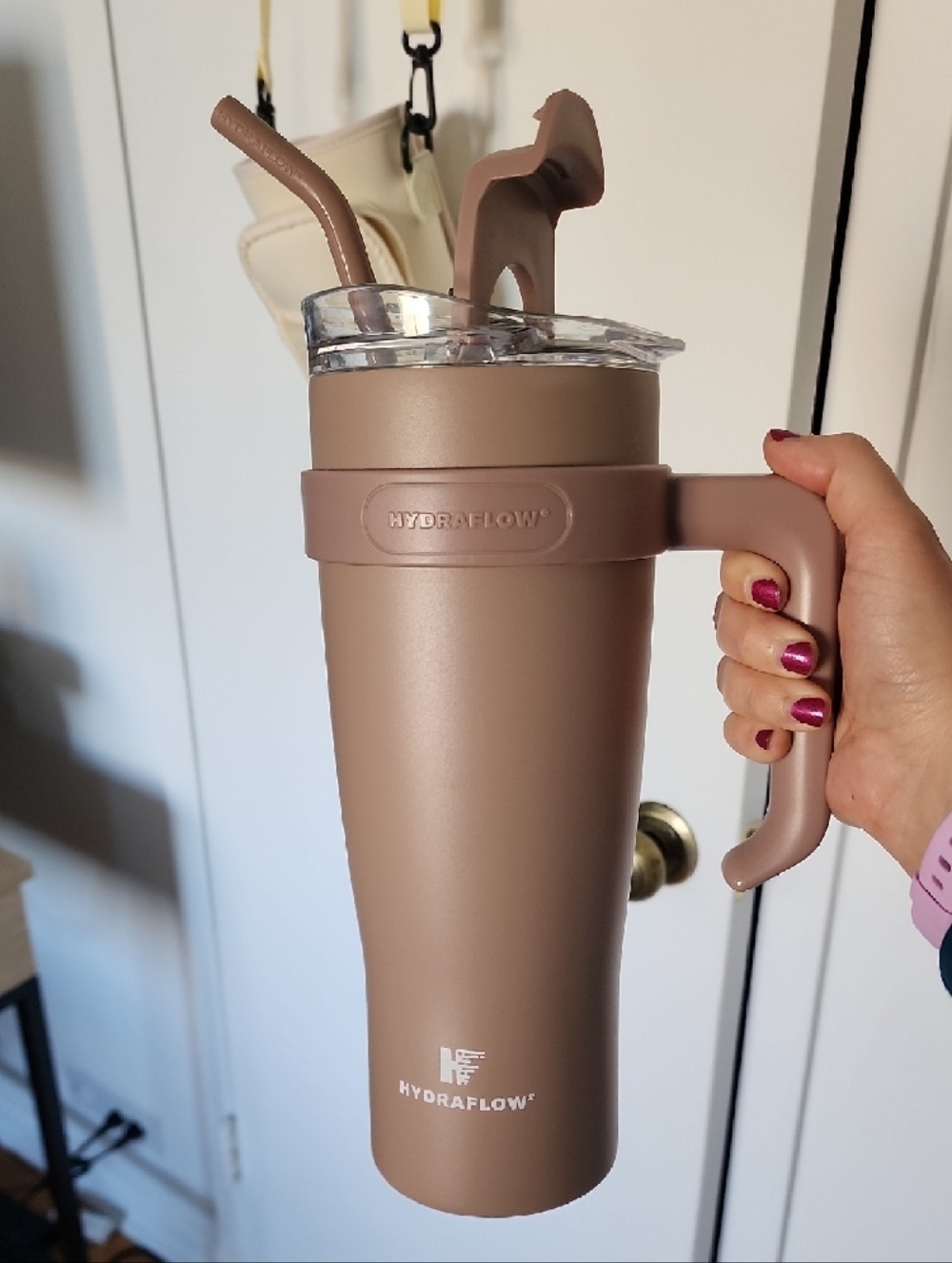 Mauve Travel Tumbler With Handle And Cream Crossbody Holder